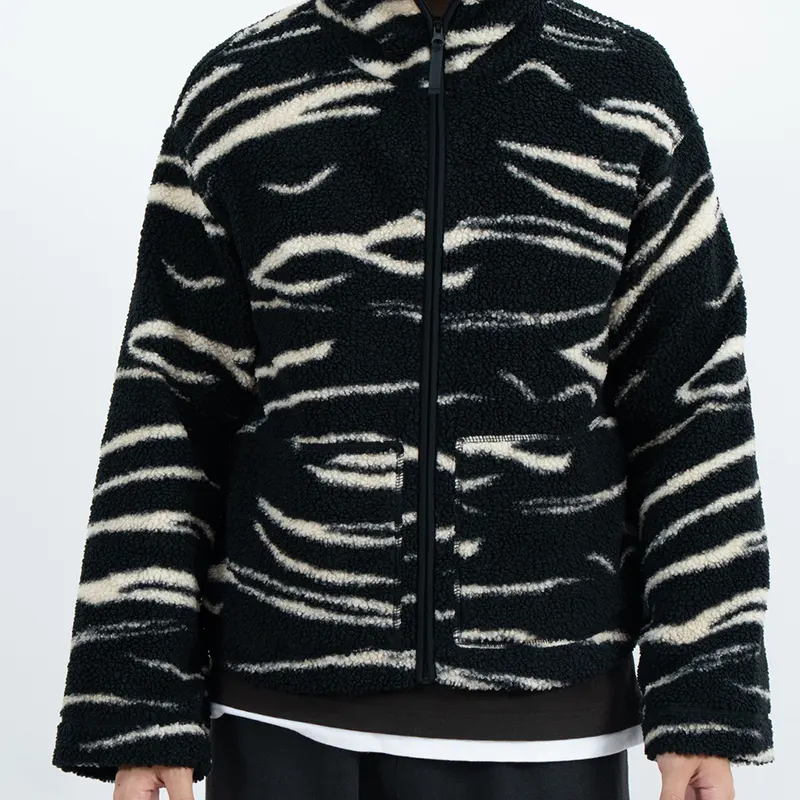 Veste polaire col montant à rayures abstraites noires et crème